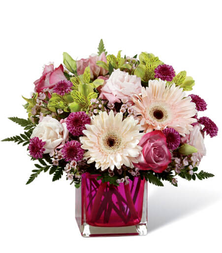 Blushing Whimsy and Lavender Rose Artisan Cube with pink gerberas and raspberry glass vase for State College graduation and new baby delivery