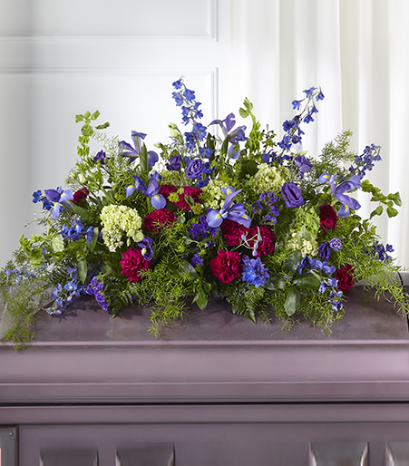 Serene Meadow and Wildflower Casket Spray with blue iris and white hydrangea for State College funeral and memorial services