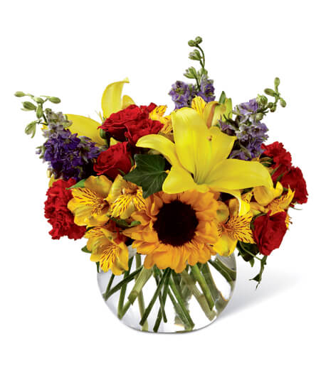 Sun-Drenched Appreciation Bubble Vase with sunflowers, red roses, and trailing ivy for State College birthday and thank-you delivery