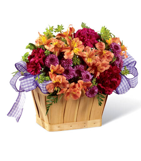 Sunset Violet Artisan Basket with orange roses and purple carnations for State College get well and graduation delivery
