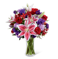 Stargazer Romance and Velvet Petals Vase with red roses and fragrant lilies for State College anniversary and luxury delivery